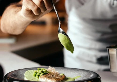 front-view-cook-preparing-food-inside-kitchen-food-meal-fry-cook copia